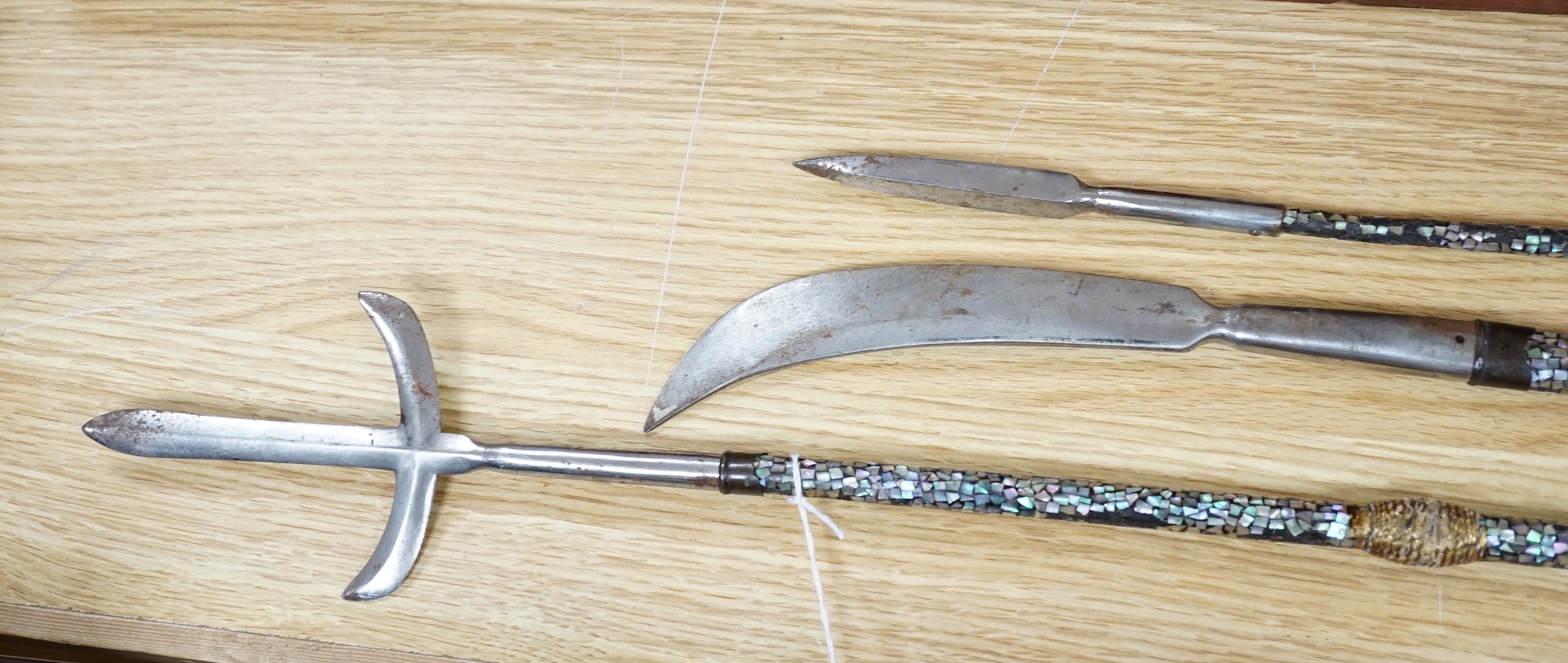 A set of three Japanese Nanban lacquer handled Samurai polearm weapons, Edo period, the largest 100cm in length